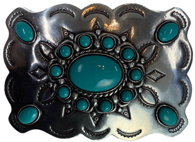 Southwestern style belt buckle with Southwestern tooling, scalloped design around edges, and simulated turquoise stones, approx. size 3 1/2" wide by 2 1/2" tall.  Color is antique silver, buckle is made of zinc. Fits belts 1 1/2" wide. Available online and in our shop just outside Nashville in Smyrna, TN.