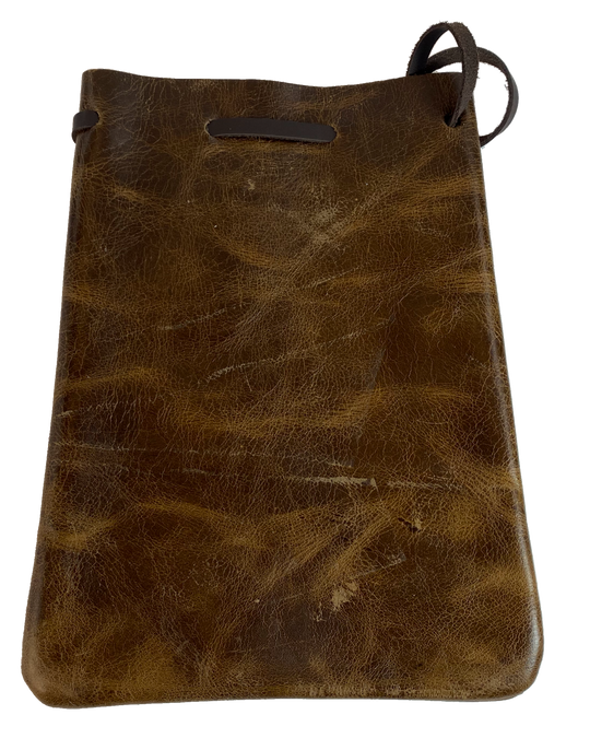 Leather pouch with drawstring. Available in Black and Assorted Brown. Fill it with anything you like, a camera, your rock collection, tools etc. This large leather pouch can be used to hold a small canteen or flask. Made in USA.