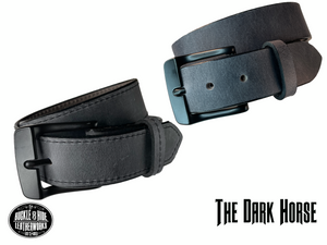 This gray leather belt is made from Crazy Horse tanned leather for that distressed and pull-up look. Choose with or without black stitching along the edges.  Has smooth black painted edges. It has a black Zinc buckle that is snapped in place. Belt is 1 1/2" wide and available in lengths from 34" to 44".  It is handmade in our shop in Smyrna, TN, just outside of Nashville.