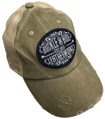 Official Buckle and Hide merchandise for your favorite leather shop just outside Nashville in Smyrna, TN Classic style cap with Buckle and Hide patch sewn on the front Mesh back Snap Back Soft unstructured top Distressed look, available in several colors