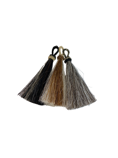 Bundled Horse Hair with loop to attach to Key Ring.