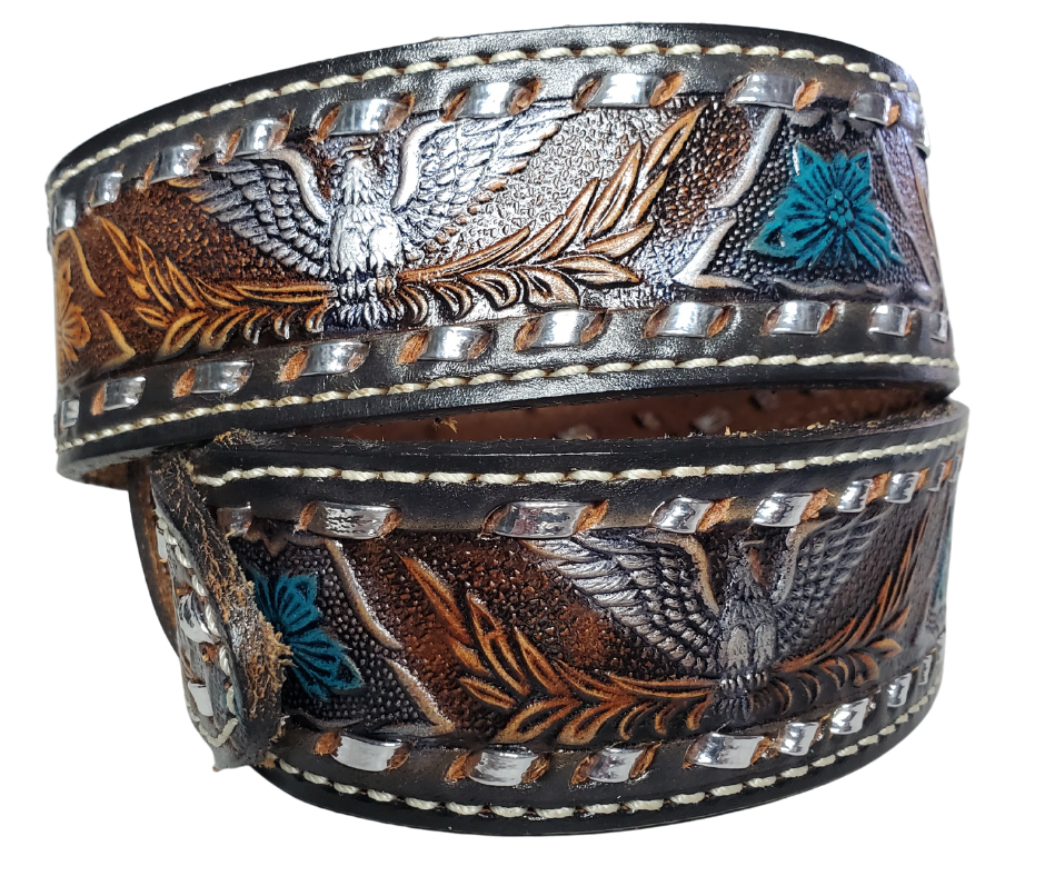 The Honky Tonk leather belt is a classic Vintage Throwback Style Western belt. Complete with silver Buck Stitching and a embossed eagle design in Black/Silver/Blue coloring. Available in a 1 1/2" width tapering up to 1 3/4" wide. Full grain vegetable tanned cowhide, Width 1 1/2" and includes Nickle plated buckle Smooth burnished painted edges. Made in USA! In stock at our Smyrna, TN shop.