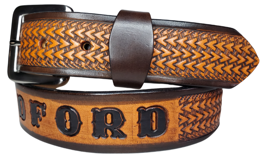 "The Wayfarer" is a handmade real leather belt made from a single strip of cowhide shoulder leather that is 8-10 oz. or approx. 1/8" thick. It has hand burnished (smoothed) edges and a Triple Arrow pattern. This belt is completely HAND dyed with a multi step finishing technic. The antique nickel plated solid brass buckle is snapped in place with heavy snaps.  This belt is made just outside Nashville in Smyrna, TN.