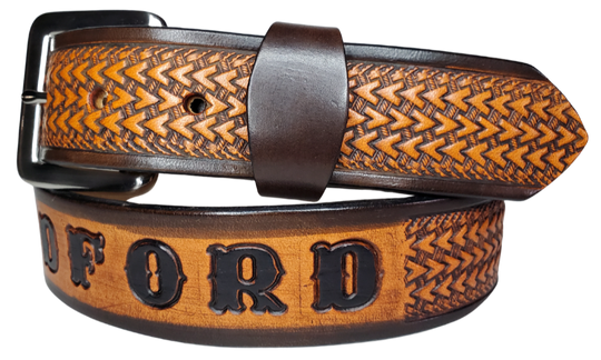 "The Wayfarer" is a handmade real leather belt made from a single strip of cowhide shoulder leather that is 8-10 oz. or approx. 1/8" thick. It has hand burnished (smoothed) edges and a Triple Arrow pattern. This belt is completely HAND dyed with a multi step finishing technic. The antique nickel plated solid brass buckle is snapped in place with heavy snaps.  This belt is made just outside Nashville in Smyrna, TN.