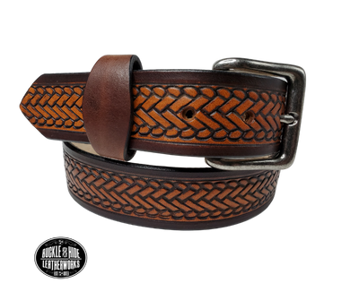 The West End handmade all leather belt is made from a single strip of Veg-Tan cowhide that is a hand finished Veg-tan that is 9-10 oz., or approx. 1/8" thick.  width  1 1/2".  It has an embossed design that is never out of style!  The antique nickel plated solid brass buckle is snapped in place. This belt is made just outside Nashville in Smyrna, TN. Perfect for casual and dress wear, it can be for personal use or for groomsman gifts or other gifts as well. 