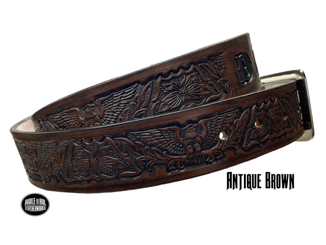 Our Patriot" Name Leather Belt is Full grain American vegetable tanned cowhide approx. 1/8"thick.&nbsp;Width 1 1/2" and includes Antique Nickle plated Solid Brass buckle. Hand Finished with Smooth burnished painted edges. Choose with or without name, if without name, design will cover entire length of belt. For name Type name desired on belt in "Type Name Here" section, no more than 10 letters maximum. Buckle snaps in place for easy changing if desired. Made in our Smyrna, TN, USA shop.