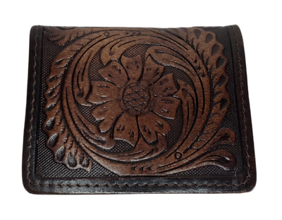 A folded Front Pocket Wallet with a Classic Western Scroll pattern Embossed on the outside and inside pockets with a unique hand stained appearance. Features 2 Credit card slots and 2 Folded cash pockets underneath. Great for the minimalist attitude at a folded 3"x 4" size. Available online and in our retail shop in Smyrna, TN, just outside of Nashville. Imported