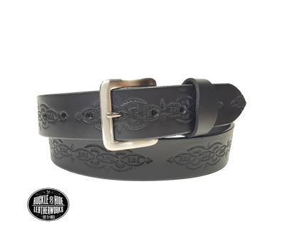 The Williamson handmade all leather belt is made from a single strip of Veg-Tan cowhide that is a hand finished Veg-tan that is 9-10 oz., or approx. 1/8" thick and is 1 1/2" thick. It has an Vintage style embossed design that is never out of style!  The antique nickel plated solid brass buckle is snapped in place. This belt is made just outside Nashville in Smyrna, TN. Perfect for casual and dress wear, it can be for personal use or for groomsman gifts or other gifts as well. 