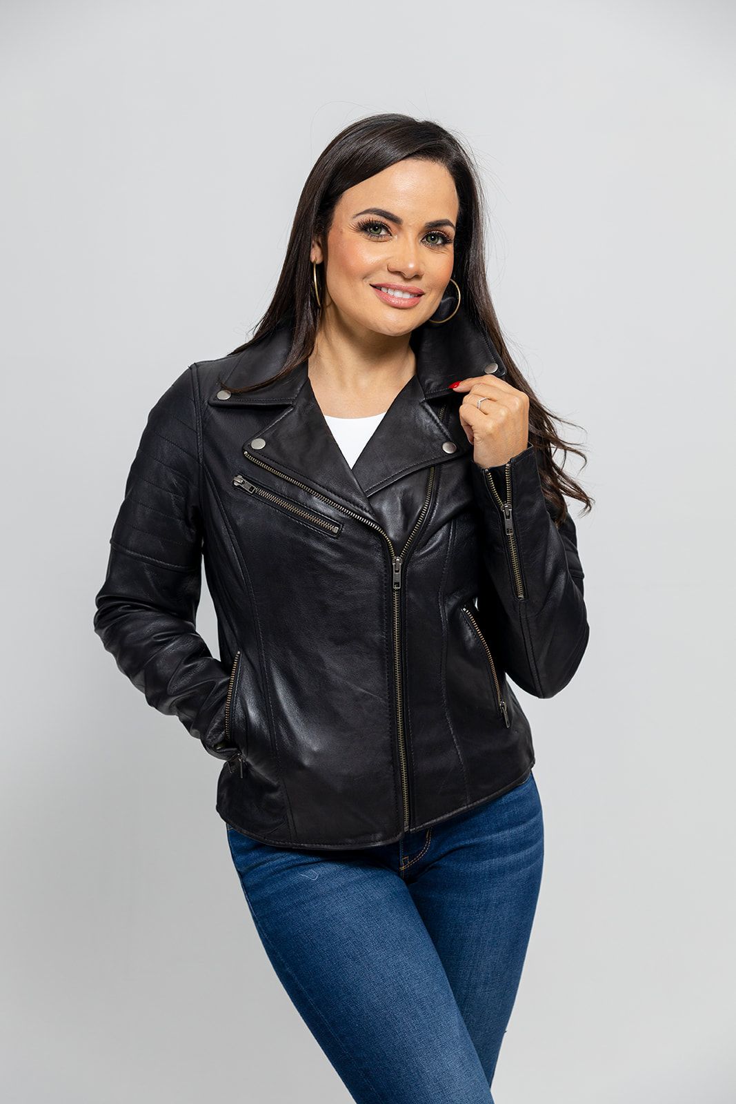 A classic rocker style jacket made from lambskin leather from Whet Blu.  Classic fit. Zip sleeves. Fully lined. One chest pocket. Two hand pockets. Lifetime Warranty on Hardware. Clean by leather specialist. Imported. Available in Black and Oxblood. Sizes XS-5X. Online Only, lifestyle picture of black jacket pictured