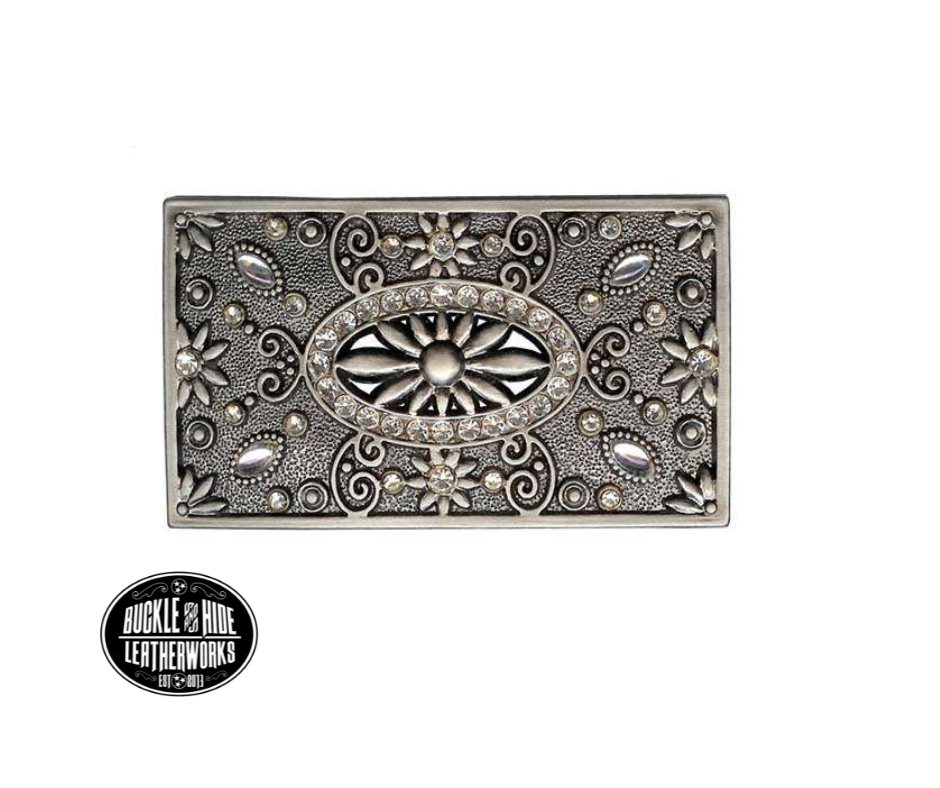 A Filigreed Floral design in Antique Nickel with Blingy Rhinestones added around the border. Looks great on plain 1 1/2" Black or Brown belt. A easy to wear rectangle shape that's not too big, it's just right. Dimension(Length X Width): 3 3/4" X 2", Imported