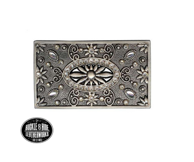 A Filigreed Floral design in Antique Nickel with Blingy Rhinestones added around the border. Looks great on plain 1 1/2" Black or Brown belt. A easy to wear rectangle shape that's not too big, it's just right. Dimension(Length X Width): 3 3/4" X 2", Imported