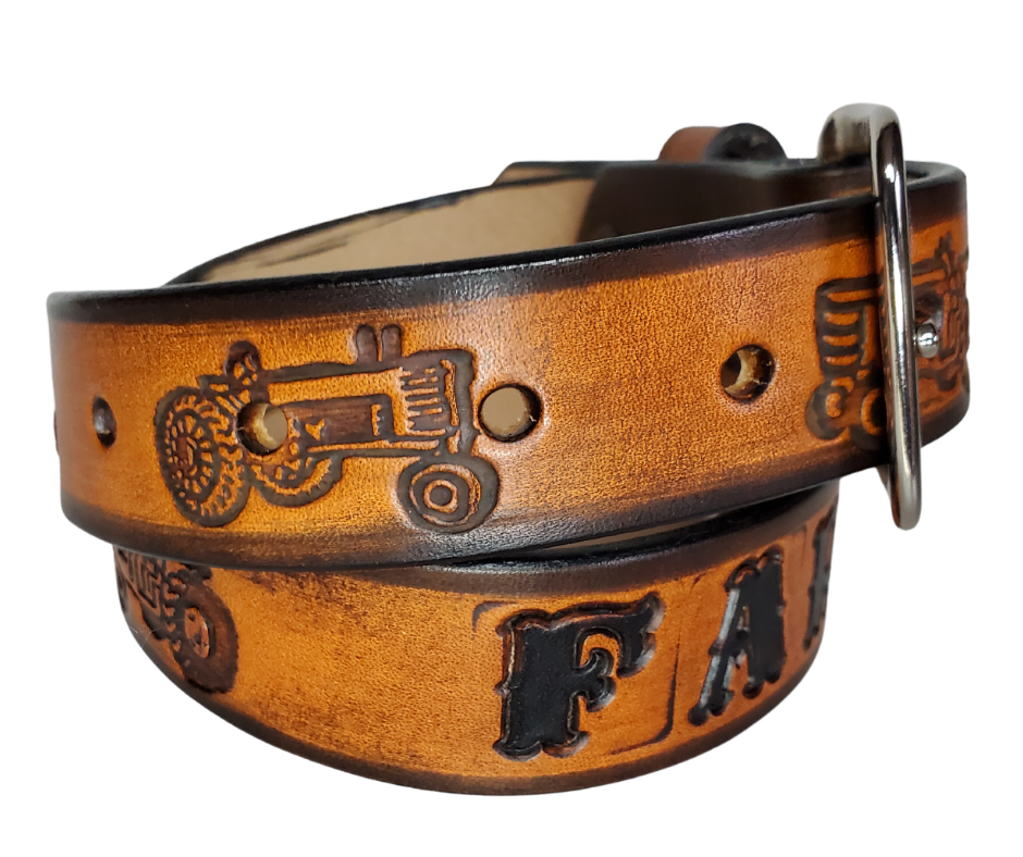 Our Lil Ferguson is just like the Ferguson for dad or mom. Full grain American vegetable tanned cowhide approx. 1/8"thick. Width is 1 1/4" and includes Antique Nickle plated Solid Brass buckle. We Hand Finished with a darker brown edge feathered into a tan center. Edges are smooth burnished painted edges. Made in our Smyrna, TN, USA shop. Buckle snaps in place for easy changing if desired. 