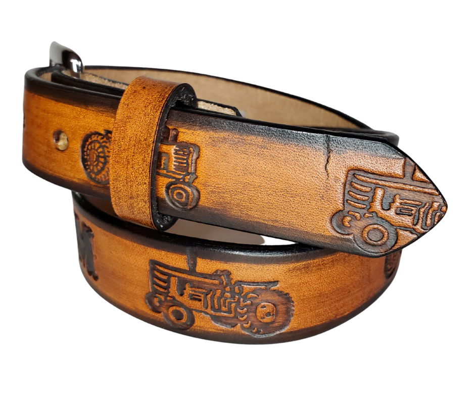 Our Lil Ferguson is just like the Ferguson for dad or mom. Full grain American vegetable tanned cowhide approx. 1/8"thick. Width is 1 1/4" and includes Antique Nickle plated Solid Brass buckle. We Hand Finished with a darker brown edge feathered into a tan center. Edges are smooth burnished painted edges. Made in our Smyrna, TN, USA shop. Buckle snaps in place for easy changing if desired. 