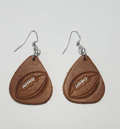 football leather earrings-Handmade Football design leather earrings Made from brown Cowhide Leather tanned in USA Earrings made in Smyrna, TN, USA Nickel free iron ear wires