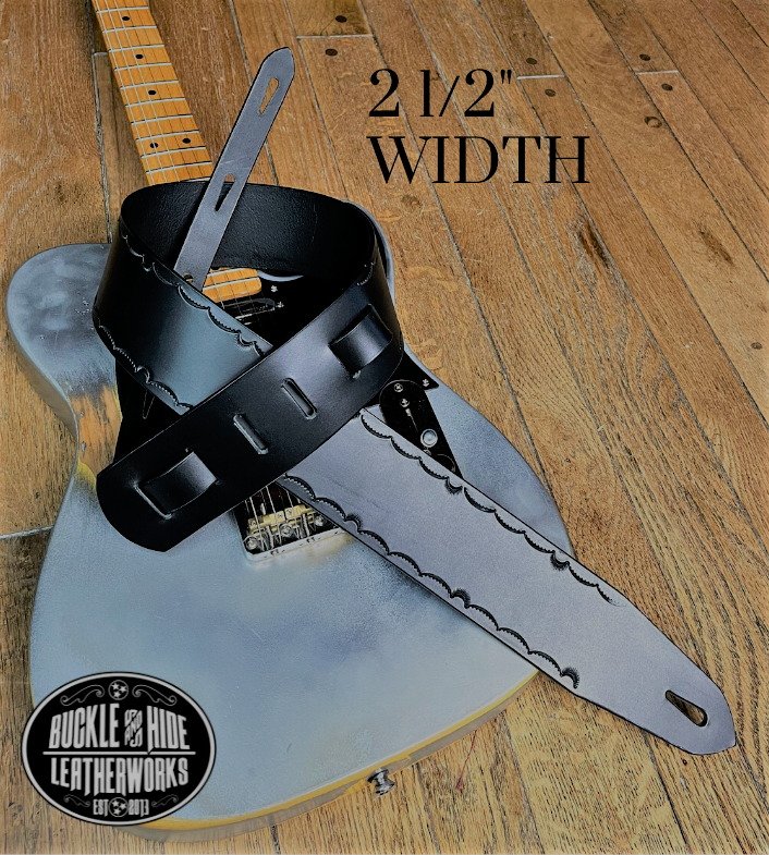 We dressed this up just a bit with a Border design versus "the CASH". It's made from 1/8" thick drum dyed vegetable tanned cow hide and has a smooth, glossy finish.  The main strap is made from a single strip of leather with beveled and painted edges.  Choose a 2" or 2 1/2" wide strap with a classic adjustment style. Made just outside Nashville in Smyrna, TN.