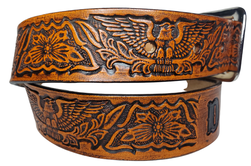 Our Kid's "Patriot" is just like the Patriot' for dad or mom. Full grain American vegetable tanned cowhide approx. 1/8"thick. Width is 1 1/4" and includes Antique Nickle plated Solid Brass buckle. We Hand Finish with each belt. Edges are smooth burnished painted edges. Made in our Smyrna, TN, USA shop. Buckle snaps in place for easy changing if desired.  Choose with or without name, if without name, 