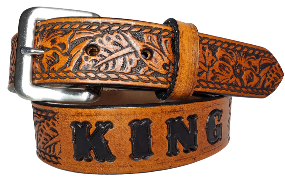 Our Kid's Ranch is just like the Ranch for dad or mom. Full grain American vegetable tanned cowhide approx. 1/8"thick. Width is 1 1/4" and includes Antique Nickle plated Solid Brass buckle. We Hand Finished with a darker brown edge feathered into a tan center. Edges are smooth burnished painted edges. Made in our Smyrna, TN, USA shop. Buckle snaps in place for easy changing if desired  Choose with or without name, 