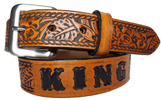 Our Kid's Ranch is just like the Ranch for dad or mom. Full grain American vegetable tanned cowhide approx. 1/8"thick. Width is 1 1/4" and includes Antique Nickle plated Solid Brass buckle. We Hand Finished with a darker brown edge feathered into a tan center. Edges are smooth burnished painted edges. Made in our Smyrna, TN, USA shop. Buckle snaps in place for easy changing if desired  Choose with or without name, 