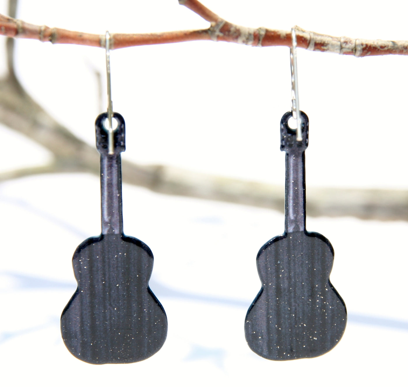 Nashville Guitar Earrings Black and White Black and white version of Nashville skyline earrings, we took this picture of downtown Nashville in February 2016.  We are the only vendors for these earrings! They have Non-tarnishing silver ear wires. Made in USA. back view