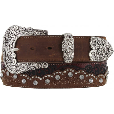 Your name doesn't have to be Kaitlyn to BLING out! The ornate 3 piece buckle is the perfect match for the western tooling, stitching and the BLING! It's 1 1/2" wide and embossed with a western style that you would find on your night out. The leather is a combination floral-tooled inlay, Swarovski crystal accents, nailhead details, beautiful tones of color. Sizing 34" to 42". It's made by Brighton for Tony Lama and is available in our Smyrna, TN shop.