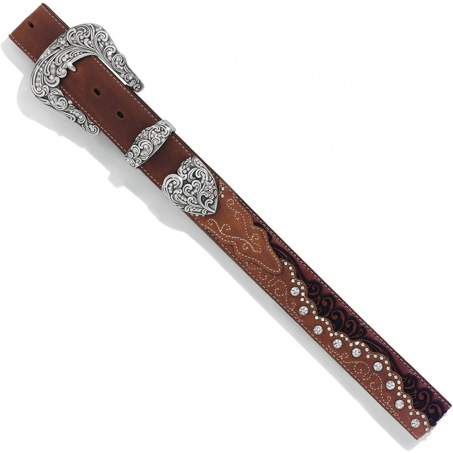 Your name doesn't have to be Kaitlyn to BLING out! The ornate 3 piece buckle is the perfect match for the western tooling, stitching and the BLING! It's 1 1/2" wide and embossed with a western style that you would find on your night out. The leather is a combination floral-tooled inlay, Swarovski crystal accents, nailhead details, beautiful tones of color. Sizing 34" to 42". It's made by Brighton for Tony Lama and is available in our Smyrna, TN shop.