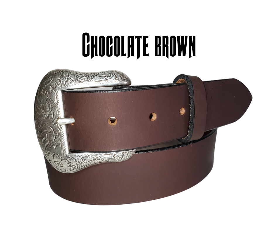 "The Sheridan" named after the well known town in Wyoming. The buckle has a Western Scroll pattern in a antique silver color that is right at home on the Ranch or Downtown, Belt is a solid strip of leather and made in our shop in Smyrna, TN, just outside of Nashville. Belt is 1 1/2" wide, choose from either distressed brown, black, or chocolate brown. Sizes available from 34"-44". Buckle is imported. Available in our retail and online shops.