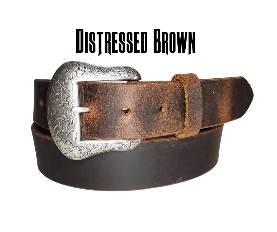 "The Sheridan" named after the well known town in Wyoming. The buckle has a Western Scroll pattern in a antique silver color that is right at home on the Ranch or Downtown, Belt is a solid strip of leather and made in our shop in Smyrna, TN, just outside of Nashville. Belt is 1 1/2" wide, choose from either distressed brown, black, or chocolate brown. Sizes available from 34"-44". Buckle is imported. Available in our retail and online shops.