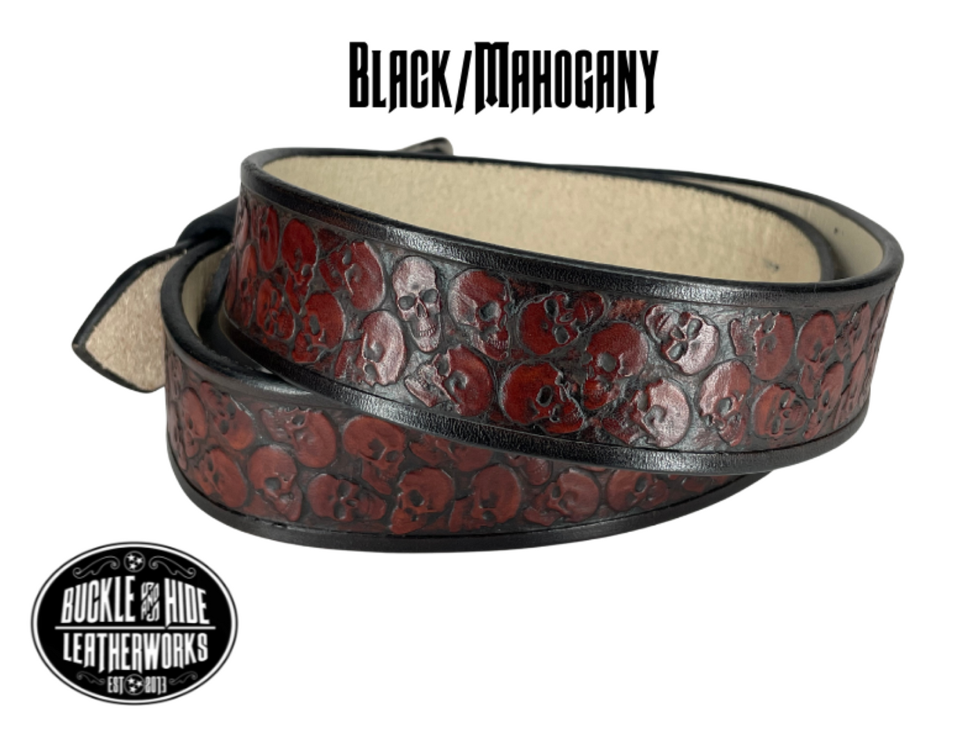 "The Forsaken" is a handmade real leather belt made from a single strip of cowhide shoulder leather that is 8-10 oz. or approx. 1/8" thick. It has hand burnished (smoothed) edges and the Serpent pattern embossed on the surface. The antique nickel plated solid brass buckle is snapped in place with heavy snaps.  This belt is made just outside Nashville in Smyrna, TN. Belt width is 1 1/2", back view of color option black/mahogany