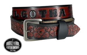 "The Forsaken" is a handmade real leather belt made from a single strip of cowhide shoulder leather that is 8-10 oz. or approx. 1/8" thick. It has hand burnished (smoothed) edges and the Serpent pattern embossed on the surface. The antique nickel plated solid brass buckle is snapped in place with heavy snaps.  This belt is made just outside Nashville in Smyrna, TN. Belt width is 1 1/2"