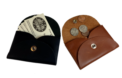 Handmade leather coin wallet with silver colored snap closure  so that coins and other small items may be carried.  Fits in the palm of the hand. BUY MORE and SAVE!  Available in either assorted brown or black leather.  Made in USA