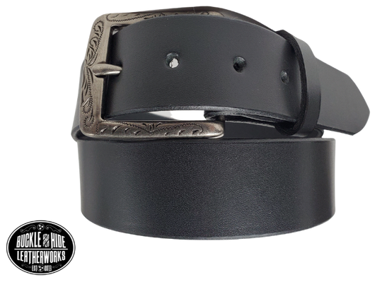 This full grain brown leather belt has a dull look that appears great dressed up or down.  It has beveled, smooth black edges and is handmade in Smyrna, TN just outside Nashville.  The Ornate scroll designed antique silver buckle is snapped in place. Our shop favorite, our customer favorite, After a short break-in period, this will be the most comfortable casual belt you will ever own.  It is 1 1/2" wide and available in sizes 34" to 44". Choose Black or Brown.