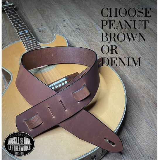 This is our basic "Tone" series. Not Flashy but all Tone! It's made from 1/8" thick drum Peanut Brown or Denim water Buffalo leather and looks great with a vintage Tele, Strat or Acoustic guitars. The main strap is made from a single strip of leather with beveled and .  Made just outside Nashville in Smyrna, TN. Choose a 2" or 2 1/2" wide strap with a classic adjustment style.  