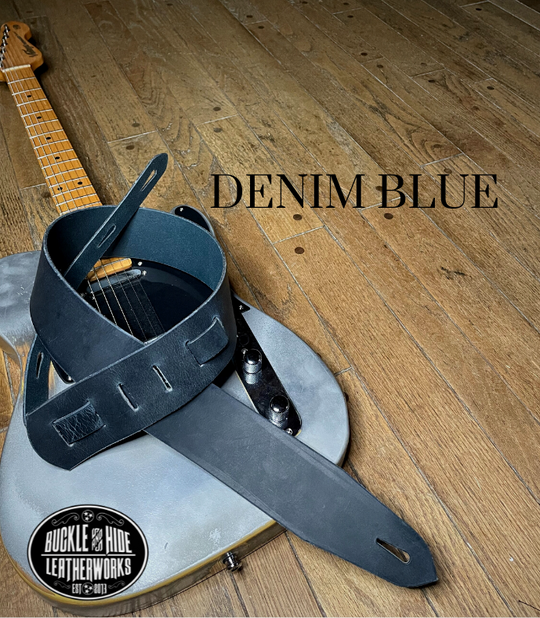 This is our basic "Tone" series. Not Flashy but all Tone! It's made from 1/8" thick drum Peanut Brown or Denim water Buffalo leather and looks great with a vintage Tele, Strat or Acoustic guitars. The main strap is made from a single strip of leather with beveled and .  Made just outside Nashville in Smyrna, TN. Choose a 2" or 2 1/2" wide strap with a classic adjustment style.  