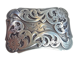 A ornate Classic Western scroll design in Antique Nickle that looks great on plain 1 1/2" Black or Brown belt. A easy to wear rectangle shape that's not too big. Not to cowboy or cowgirl just enough of the west. Imported
