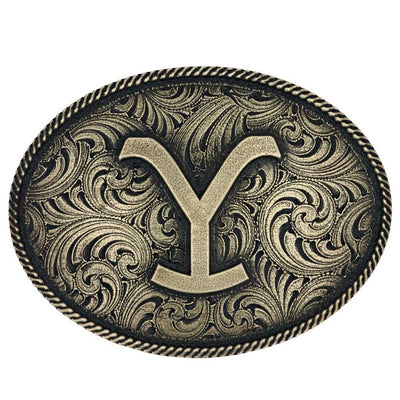 Belt Buckle in an oval in shape with a gold-toned Yellowstone Y brand in the center. Around the Y is ornate filigree trimmed in rope. The background of this buckle is an antiqued black. Standard 1.5 inch belt swivel.